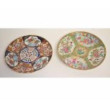 19th century famille rose plates, typically decorated, with coloured panels, together with a further