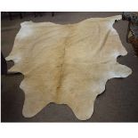 Natural cream cow-hide rug, 170cms wide x 200cms long