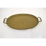 Oval brass tray with incised decoration of roses