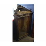 Victorian Gothic oak corner cupboard with single glazed door, fitted with adjustable shelves, with