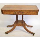 Regency broomwood with kingwood fold-over card table with red baize lined interior with decorative