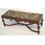 19th century mahogany rectangular foot stool with decorative embroidered seat, on four turned