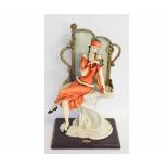 Guiseppe ?, Florence seated figure of a lady on a dressing table with mirrored back, limited edition