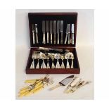 Teak cased 12-place setting of Community Sheffield plate cutlery, together with a further bag of