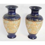 Pair of Doulton Lambeth bulbous vases, with a blue ground, with central band of gilt and blue