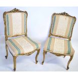 Louis XV style giltwood suite comprising a two-seater sofa with striped upholstered seat and back,