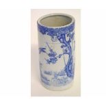 20th century blue and white printed circular brush pot with a bird and blossom tree decoration,