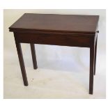 Georgian mahogany fold-over tea table of plain form raised on square legs, fitted with single drawer