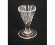 19th century small conical port glass on a stepped circular foot, 7cms