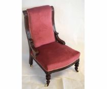 Victorian mahogany nursing chair with puce Dralon upholstered seat and back with turned front legs