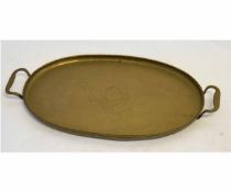 Vintage pressed brass oval two-handled tray with central pressed detail of a rose, 65cms wide