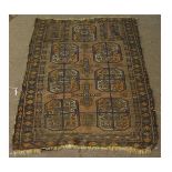 Vintage Bokhara type rug with a brown field and repeating lozenge centre, 86cms wide x 140cms long