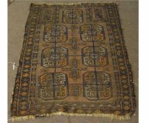 Vintage Bokhara type rug with a brown field and repeating lozenge centre, 86cms wide x 140cms long