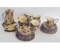 Part Royal Winton Marguerite tea wares comprising 8 cups and 7 saucers, 11 varying size plates, a