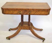 Regency broomwood with kingwood fold-over card table with red baize lined interior with decorative