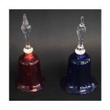 Two 19th century glass bells, one in ruby glass, the other Bristol Blue, with clear glass handles,