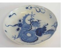 Unusual blue and white dish, with a dragon chasing the flaming pearl, 20cms diam