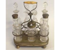 Victorian silver plated seven-bottle cruet with associated bottles with plated lids and central