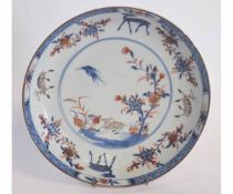 Chinese dish decorated in Imari style with foliage and deer, 28cms diam