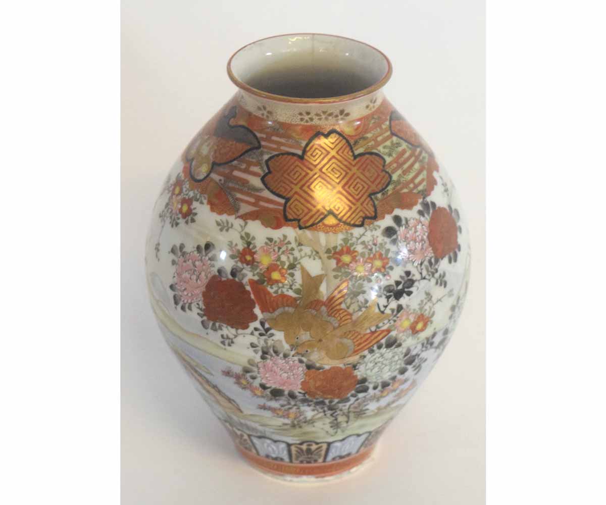 Japanese Satsuma baluster vase decorated in typical colours, 18cms high