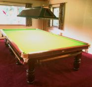 Modern mahogany framed full size snooker table on 8 heavy turned legs and accessories including