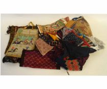 Bag containing mixed bunting, scarves, bags from around the world
