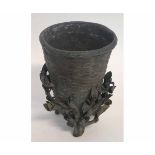 Vintage bronze basket formed vase on three flower encrusted feet, 18cms tall