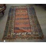 Good quality floor rug with central rust panel, with geometric design and multi-gulled border,