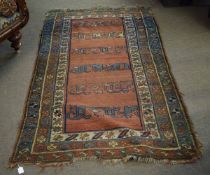 Good quality floor rug with central rust panel, with geometric design and multi-gulled border,