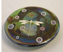 K Keat signed iridescent paperweight with mounted silver dragonfly, 10cms diam