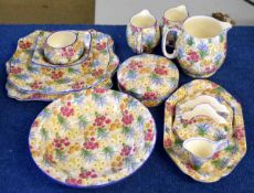 Grimwades Royal Winton Marguerite graduated set of three jugs, a further circular storage container,