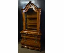 Good quality walnut bombe chest fitted with four full width drawers with glazed arched top cabinet