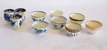 Collection of English porcelain tea bowls and cups, decorated with blue printed and polychrome