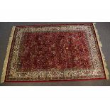 20th century Kashmir rug, "Tree of Life" design to a red ground, 240 x 160cms
