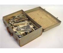 Small suitcase containing a quantity of vintage postcards