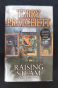 TERRY PRATCHETT: RAISING STEAM, London, Doubleday, 2013, 1st edition, signed to title page and