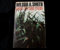 WILBUR A SMITH: WHEN THE LION FEEDS, London, Heinemann, 1964, 1st edition, 1st impression,