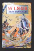 TERRY PRATCHETT: WINGS, London, Doubleday, 1990, 1st edition, signed to title page, original cloth