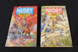 TERRY PRATCHETT: 2 titles: THE DARK SIDE OF THE SUN, London, Doubleday, 1994, 1st printing of the