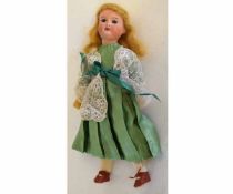 Early 20th century German porcelain headed doll, the head stamped "Made in Germany, 390, 4/0 XM",