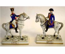 Pair of 20th century Continental porcelain equestrian groups, "Legionnaires", 20cms wide x 27cms