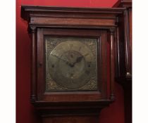 Composite oak cased 8-day longcase clock, the hood with overhanging cornice to free-standing columns