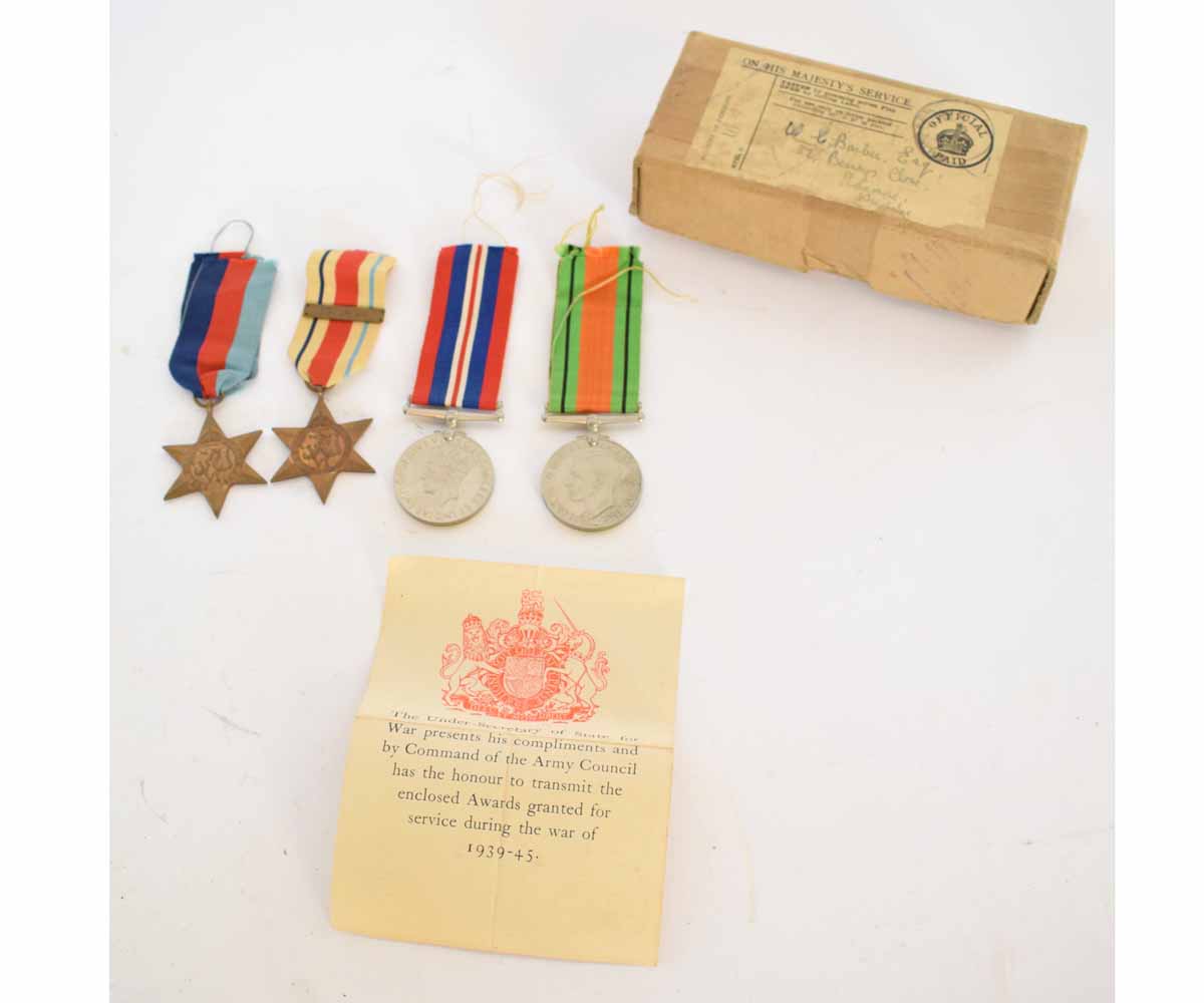 WWII group of four comprising 39-45 Star, Africa Star with 8th Army clasp, Defence Medal and 34-45