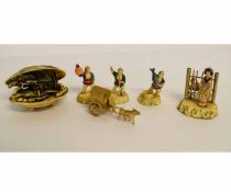 Group of six assorted Oriental celluloid ornaments of figures, clam shell, dog cart etc, some