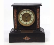 Late 19th century black and variegated marble mantel timepiece, the plinth shaped case with