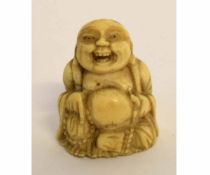 Japanese carved ivory miniature figure of a Hoeti with open mouth, 3cms tall