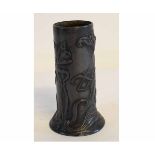 Art Nouveau pewter spill holder, raised decoration of stylised entwined flowers, 13cms tall