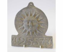 Cast lead fire mark decorated with a sun, 425573, height 18 1/2cms