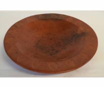 Studio pottery terracotta dish with a shield design to the border, (being sold for a local charity),