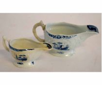 Two Lowestoft sauce boats, the largest with moulded floral design with little fisherman pattern to